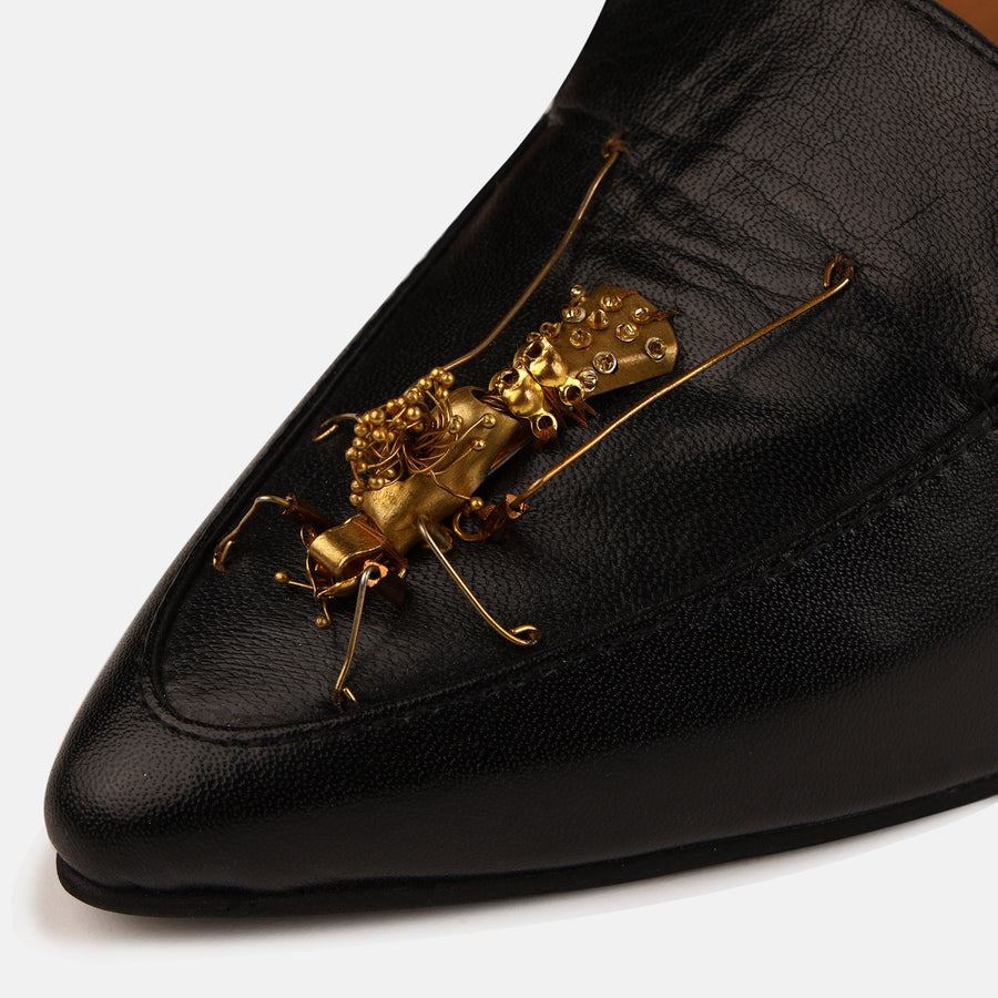 Black insect mule heels